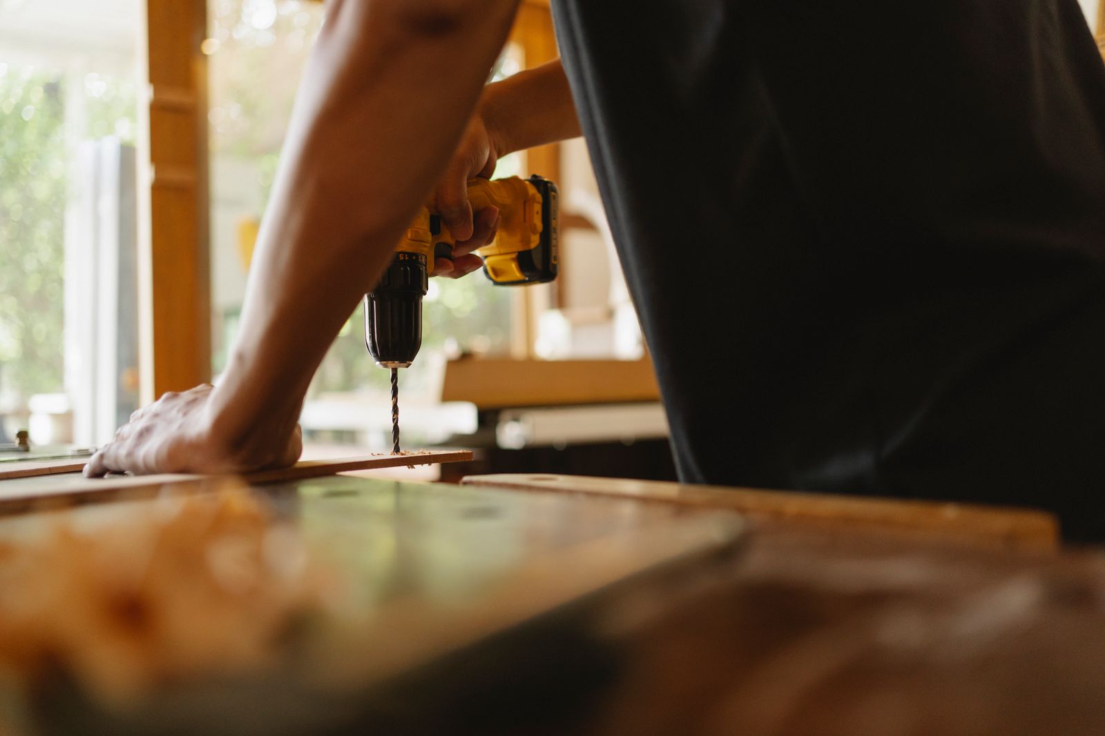 Studio carpenter working on a kitchen installation